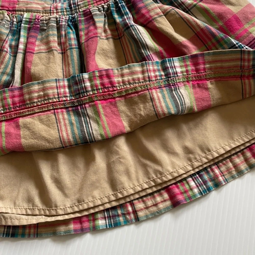 Cherokee tan, pink & blue plaid skirt.  Girls size small 6 - 6x